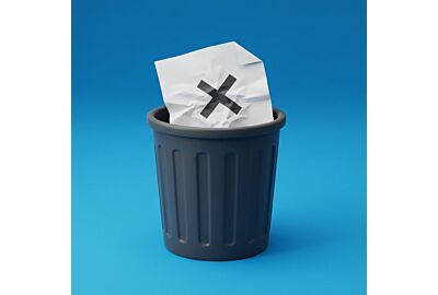 Trash can with tossed page